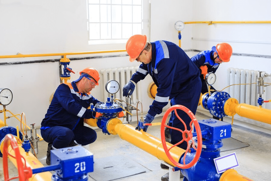 people working with gas distribution center