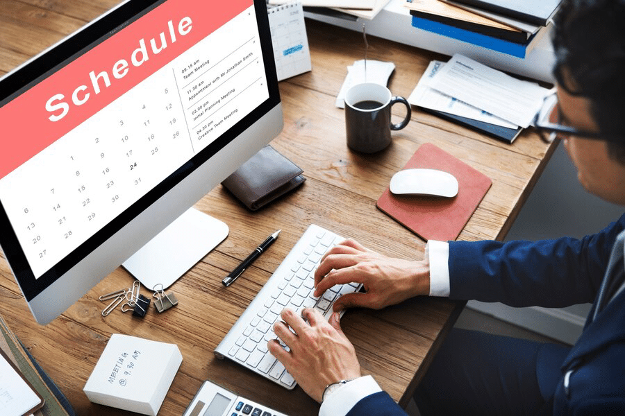 man working with the schedule